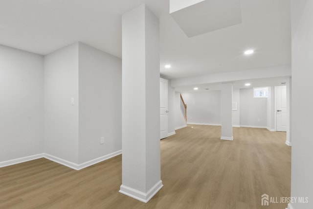 39 S Pierson Rd, Maplewood, NJ 07040 - basement featuring light wood-type flooring, recessed lighting, baseboards, and stairs