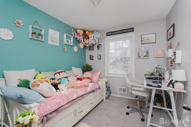 bedroom featuring light carpet