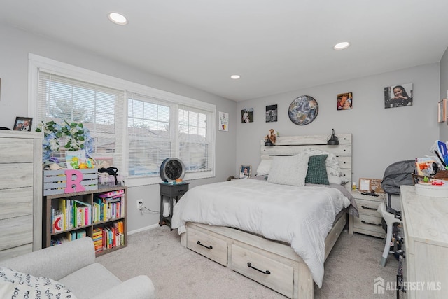 bedroom with light carpet