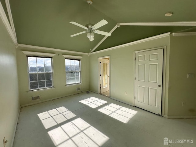 unfurnished room featuring crown molding, ceiling fan, and vaulted ceiling