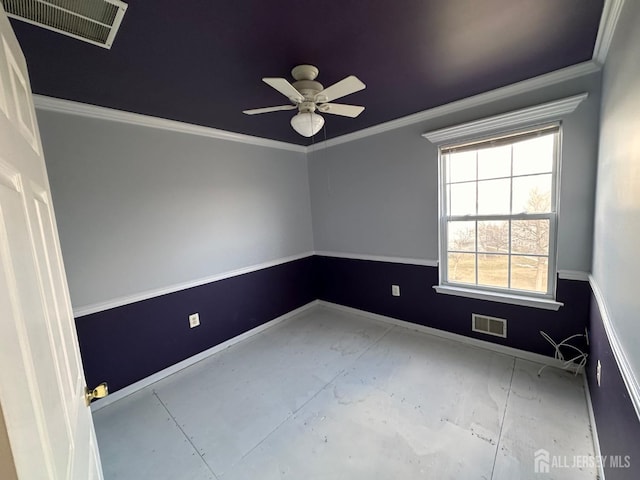 empty room featuring crown molding and ceiling fan