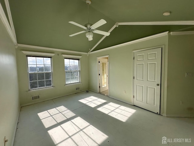 interior space featuring ornamental molding and lofted ceiling