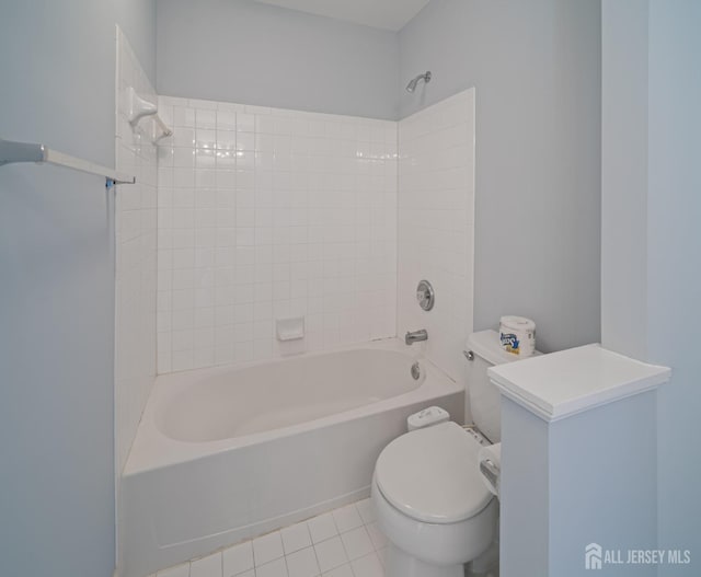 full bath featuring tile patterned flooring, tub / shower combination, and toilet