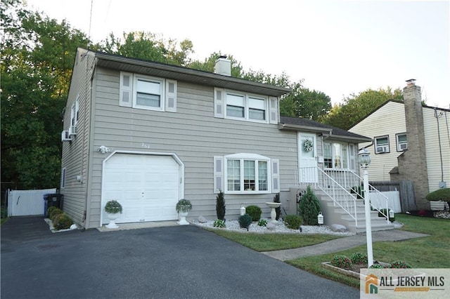 tri-level home with a garage