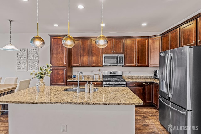 22 Larkspur Ln, Monroe, NJ 08831 - kitchen with appliances with stainless steel finishes, dark wood finished floors, light stone countertops, recessed lighting, and decorative light fixtures