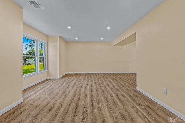 empty room with light wood-type flooring