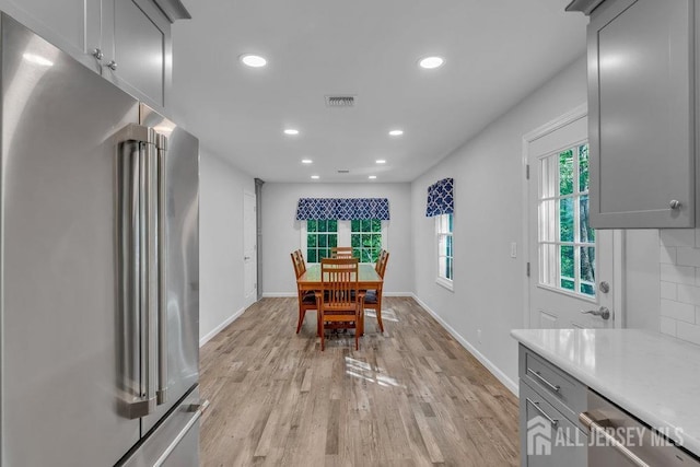 74 Ravine Dr, Matawan, NJ 07747 - dining space featuring light wood-style flooring and recessed lighting