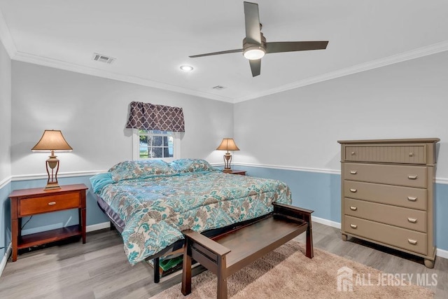 74 Ravine Dr, Matawan, NJ 07747 - bedroom with wood finished floors, ornamental molding, and ceiling fan