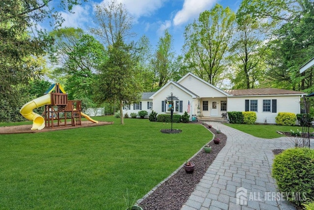74 Ravine Dr, Matawan, NJ 07747 - view of grassy yard with a playground