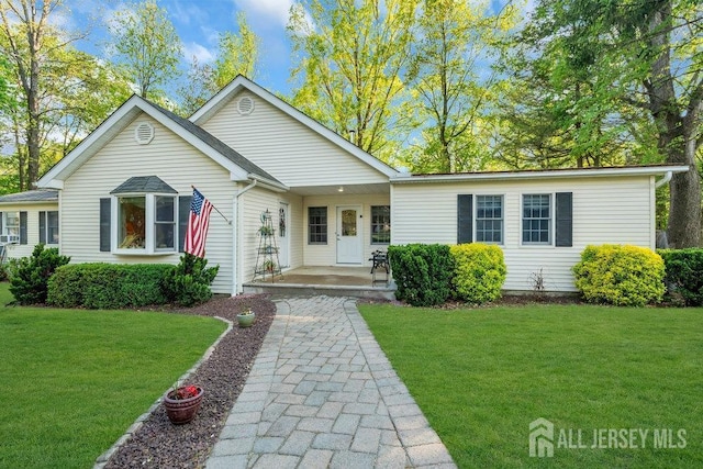74 Ravine Dr, Matawan, NJ 07747 - ranch-style house featuring a front lawn