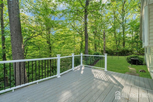 74 Ravine Dr, Matawan, NJ 07747 - wooden terrace with a lawn