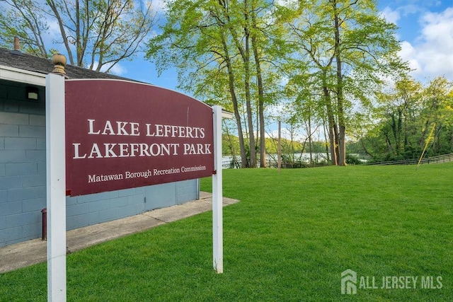 74 Ravine Dr, Matawan, NJ 07747 - community sign with a lawn