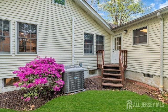 74 Ravine Dr, Matawan, NJ 07747 - entrance to property with crawl space and a lawn