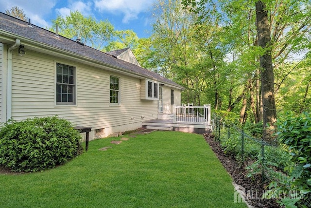 74 Ravine Dr, Matawan, NJ 07747 - view of green lawn with a deck