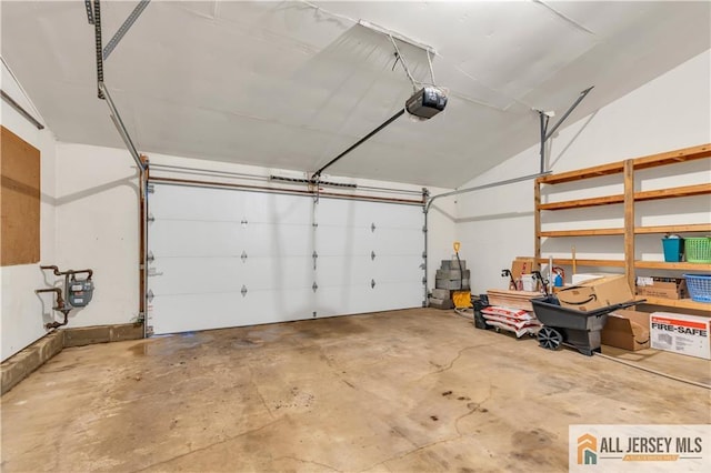 garage featuring a garage door opener