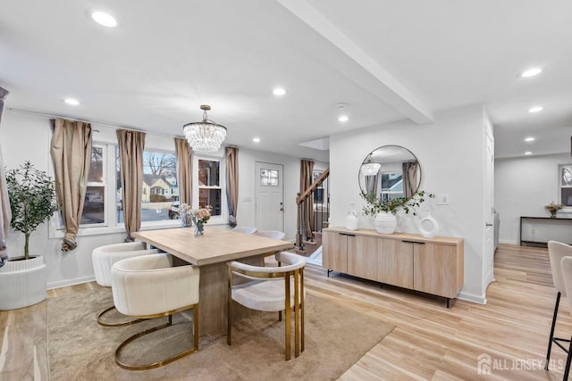 dining area with light wood-style floors, stairs, beam ceiling, and recessed lighting