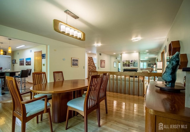 dining room with light wood finished floors
