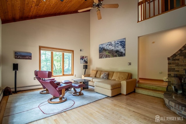 living room featuring wood finished floors, high vaulted ceiling, a baseboard heating unit, ceiling fan, and wood ceiling