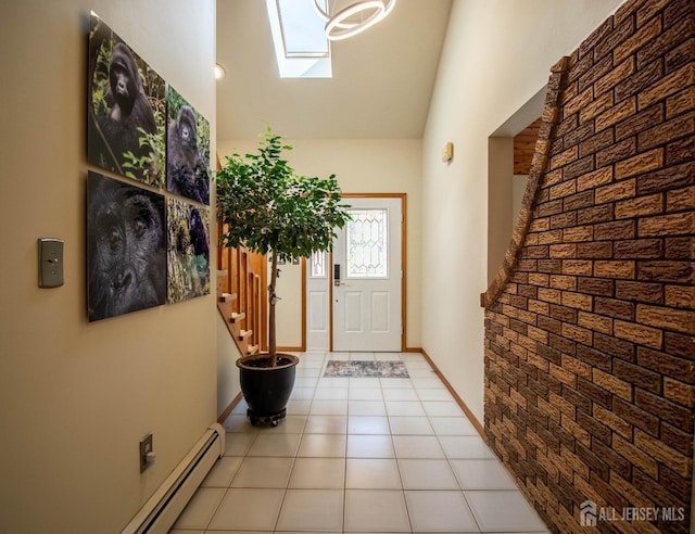 foyer featuring lofted ceiling, light tile patterned floors, a baseboard radiator, and stairway