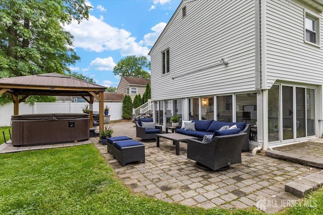 606 Hayward St, Bound Brook, NJ 08805 - view of patio featuring a hot tub, outdoor lounge area, and a gazebo