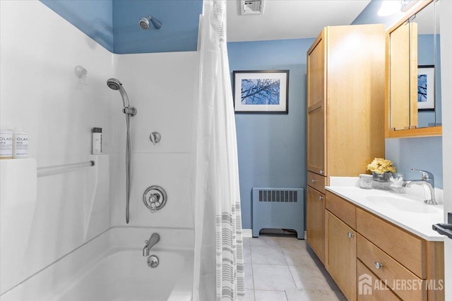 606 Hayward St, Bound Brook, NJ 08805 - bathroom with radiator, vanity, shower / bath combo with shower curtain, and tile patterned floors