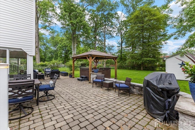 606 Hayward St, Bound Brook, NJ 08805 - fenced backyard featuring a hot tub, a patio area, grilling area, and a gazebo