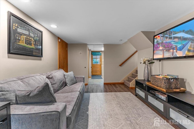 606 Hayward St, Bound Brook, NJ 08805 - living room with wood finished floors, stairway, and recessed lighting