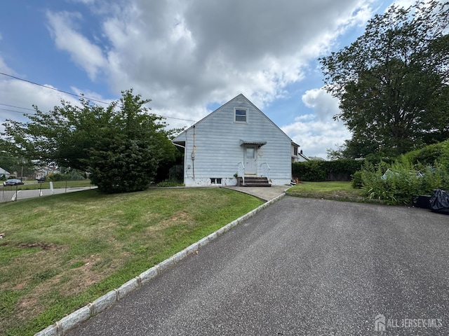 64 Bender Ave, Iselin, NJ 08830 - view of side of property featuring entry steps and a lawn