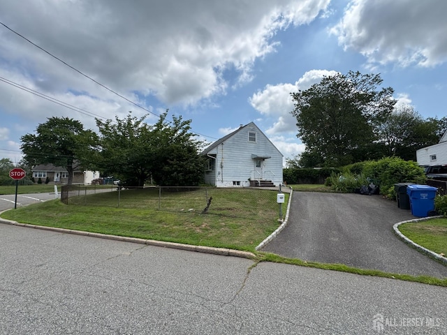 64 Bender Ave, Iselin, NJ 08830 - view of front facade featuring driveway