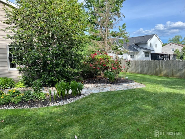 view of yard with fence