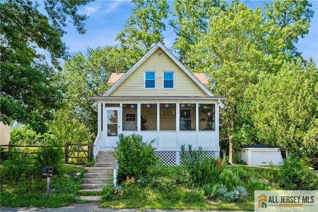 4 Woodrow St, Middlesex, NJ 08846 - bungalow featuring a sunroom and an outbuilding