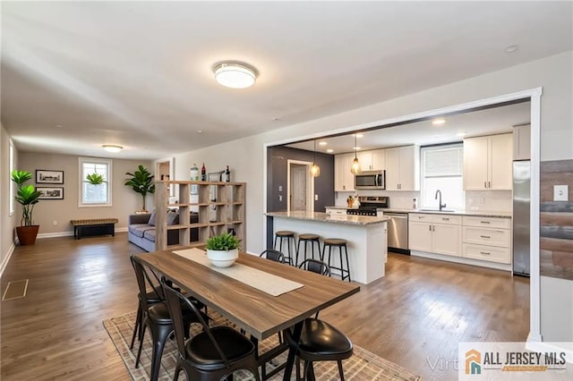 4 Woodrow St, Middlesex, NJ 08846 - dining area with wood finished floors and recessed lighting