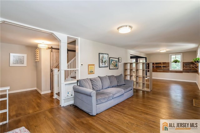 4 Woodrow St, Middlesex, NJ 08846 - living room with wood finished floors and a barn door