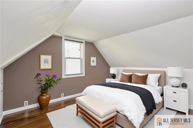 4 Woodrow St, Middlesex, NJ 08846 - bedroom featuring wood finished floors and vaulted ceiling