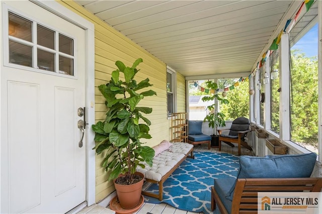 4 Woodrow St, Middlesex, NJ 08846 - sunroom / solarium featuring an outdoor hangout area