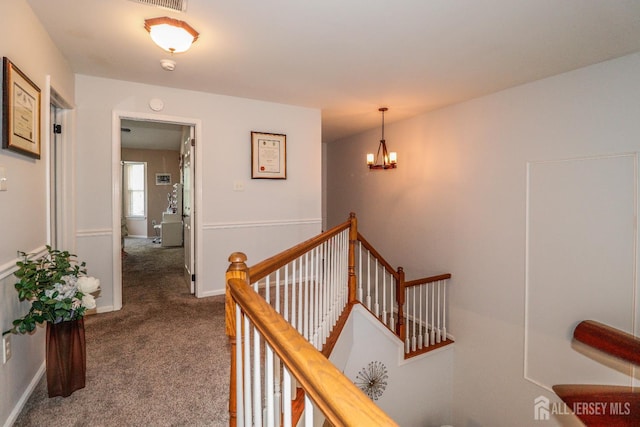 802 Carnaby Ln, Toms River, NJ 08753 - corridor with an upstairs landing, carpet floors, and a chandelier