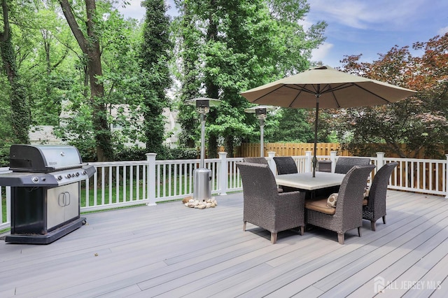 70 Surrey Ln, Woodbridge Proper, NJ 07067 - wooden terrace with grilling area and outdoor dining area