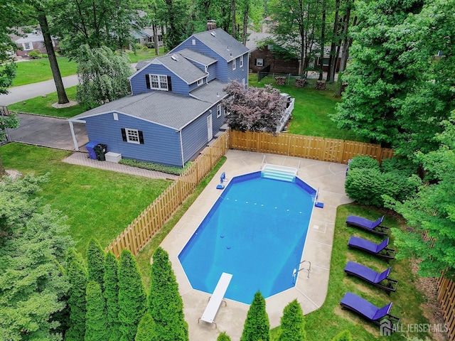 70 Surrey Ln, Woodbridge Proper, NJ 07067 - view of swimming pool featuring a diving board and a fenced backyard