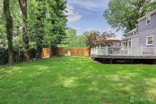 70 Surrey Ln, Woodbridge Proper, NJ 07067 - view of yard with a wooden deck