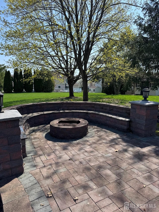 35 NE Bennett Rd, Old Bridge, NJ 07747 - view of patio featuring an outdoor fire pit