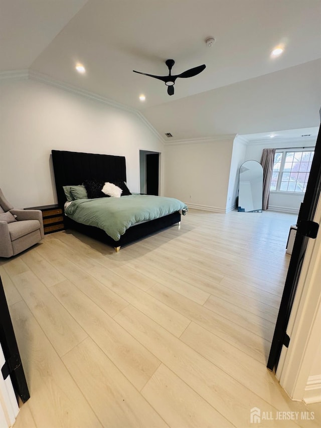 35 NE Bennett Rd, Old Bridge, NJ 07747 - bedroom with wood finished floors, recessed lighting, vaulted ceiling, crown molding, and baseboards