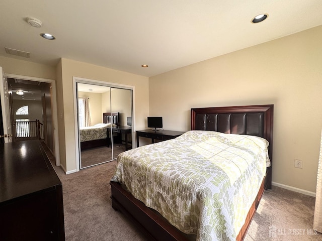 bedroom featuring baseboards, carpet, a closet, and recessed lighting