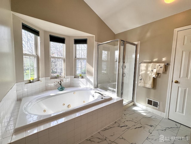 full bath with visible vents, a stall shower, a whirlpool tub, marble finish floor, and lofted ceiling