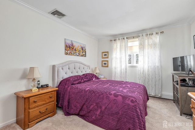 carpeted bedroom featuring crown molding