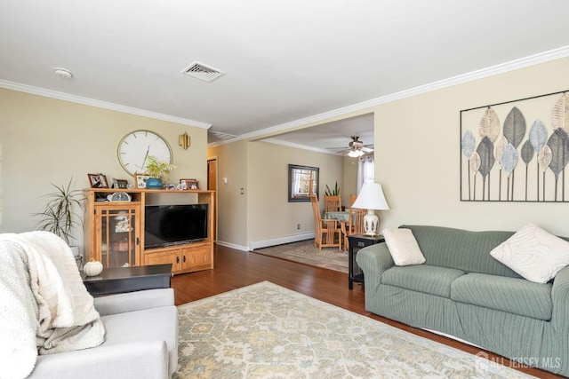 living room featuring crown molding, a baseboard radiator, dark hardwood / wood-style flooring, and ceiling fan