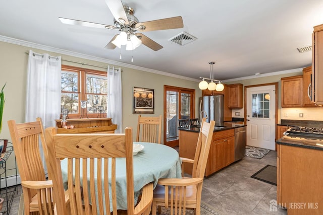 dining room featuring ornamental molding, ceiling fan, and french doors