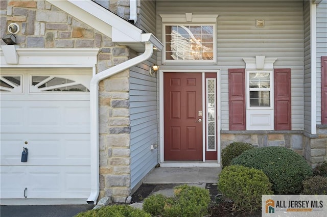 21 Capica Ct Unit 89, South Amboy, NJ 08879 - doorway to property featuring stone siding