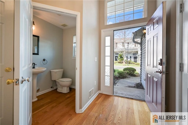 21 Capica Ct Unit 89, South Amboy, NJ 08879 - foyer with light wood finished floors and plenty of natural light
