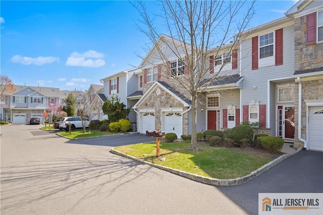 21 Capica Ct Unit 89, South Amboy, NJ 08879 - multi unit property with a residential view, stone siding, driveway, and a garage