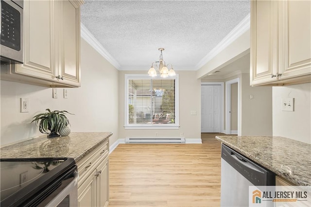 kitchen featuring light wood-style floors, a baseboard radiator, stainless steel appliances, and a chandelier
